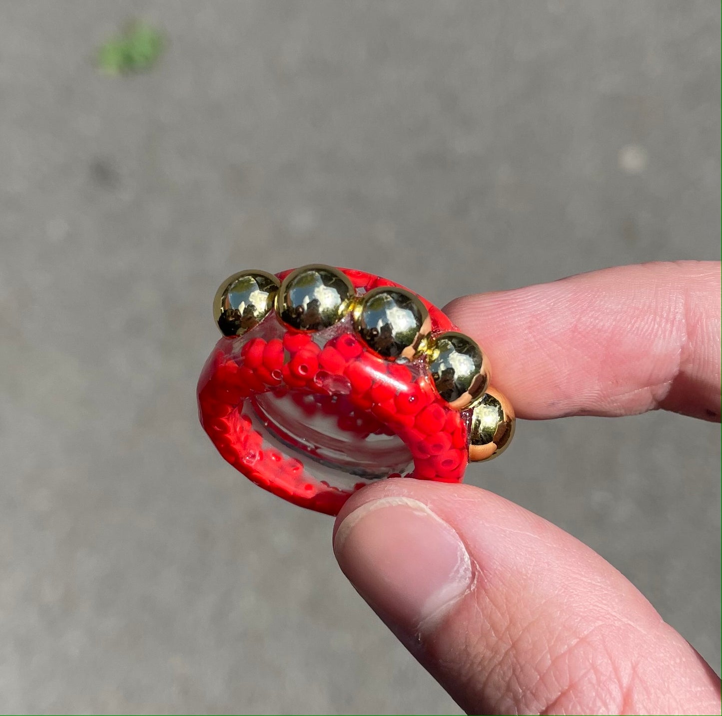 Red dotted gold bead ring