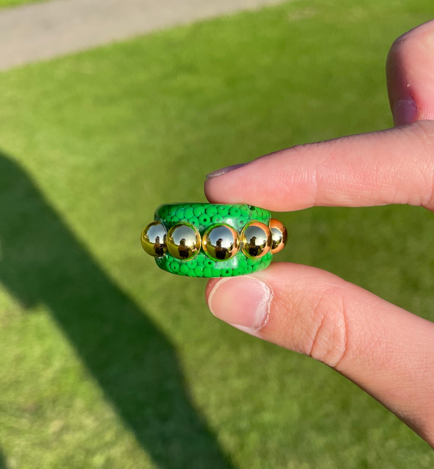 Green dotted gold bead ring set